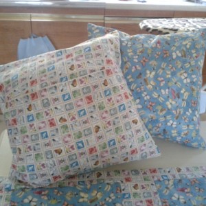 Butterfly and stamp cushion 